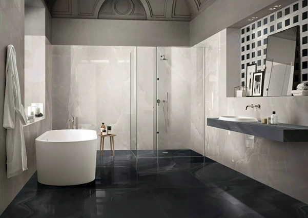 A luxury bathroom with decorative tile accent wall
