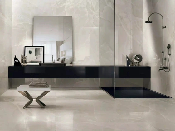 Spacious luxury bathroom featuring stylish tile design