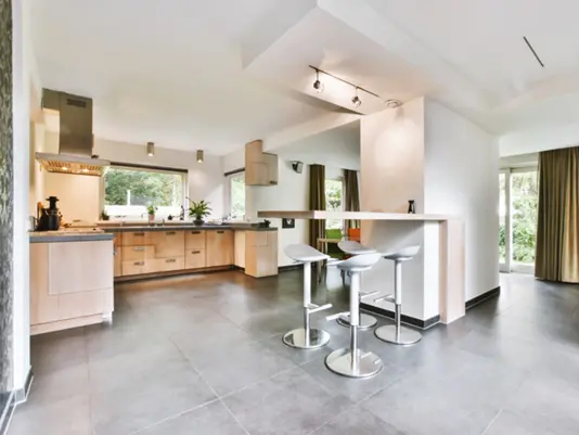 Stylish black and white patterned kitchen floor tiles