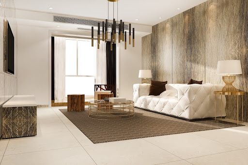 Contemporary living room design featuring large format floor tiles, a white sofa, and modern lighting fixtures